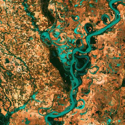 The Mississippi River winding through green lowlands